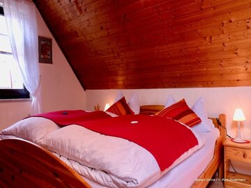 Ihr gemütliches Schlafzimmer in Ihrer Ferienwohnung in Muggendorf